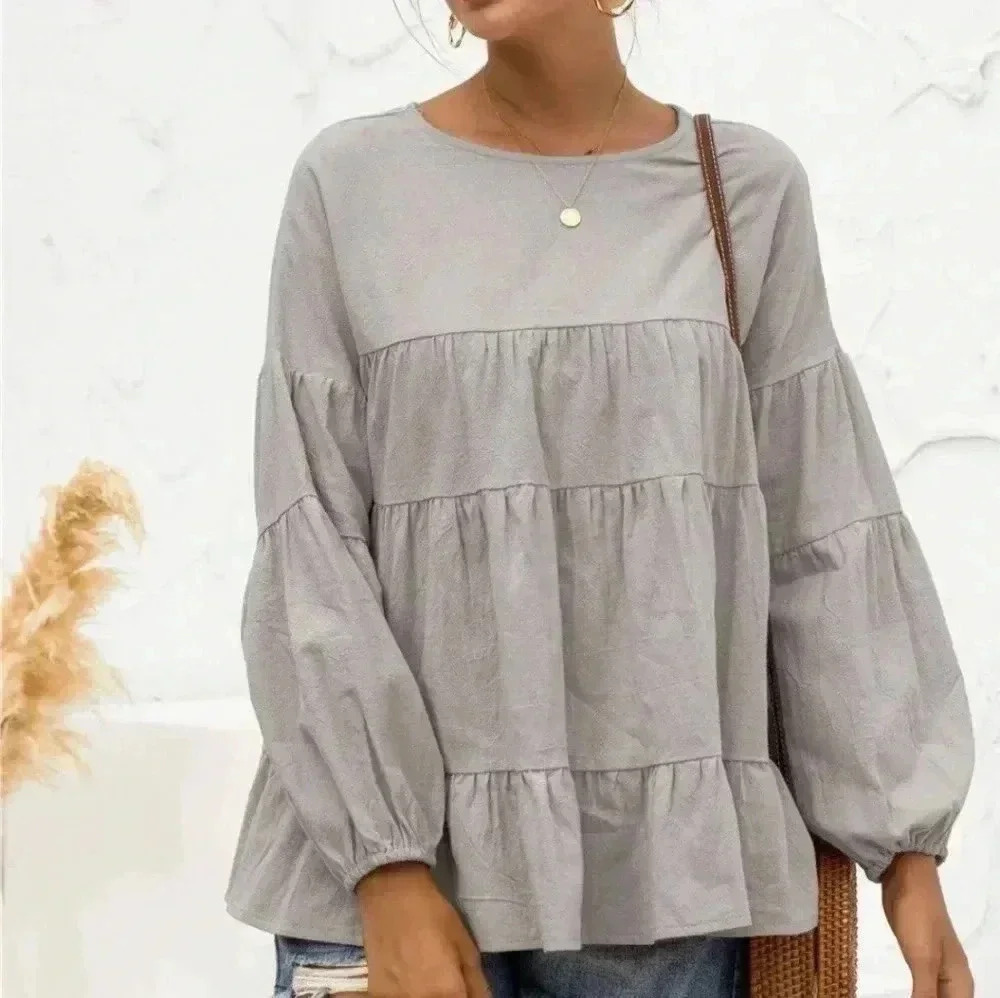- Tiered top. Size Medium